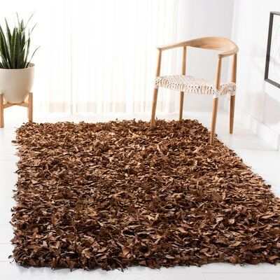 Tan brown cowhide patchwork leather carpet classic room