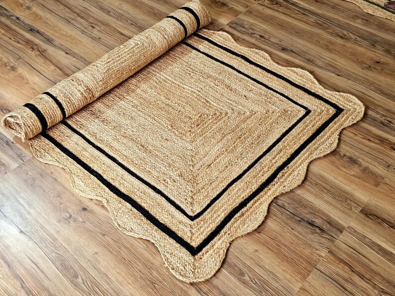 Natural jute square rug with black border and scallop edge