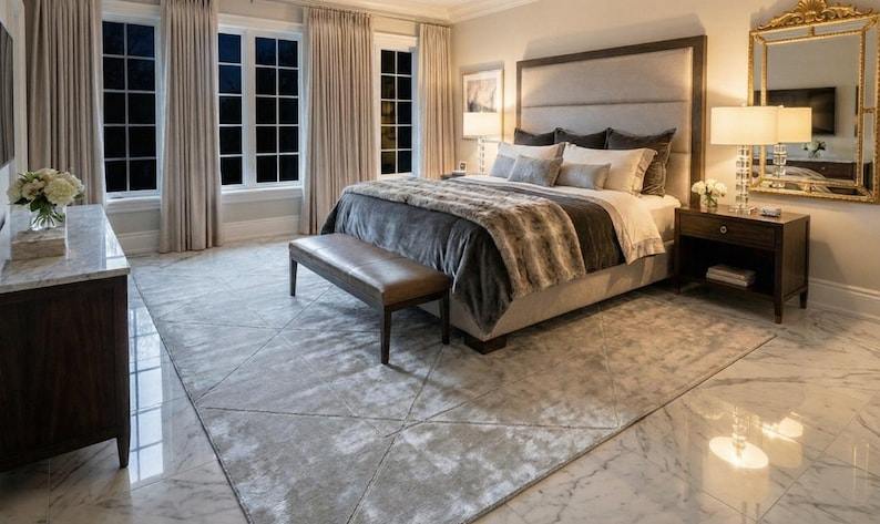 Silver grey textured silk rug in luxury master bedroom