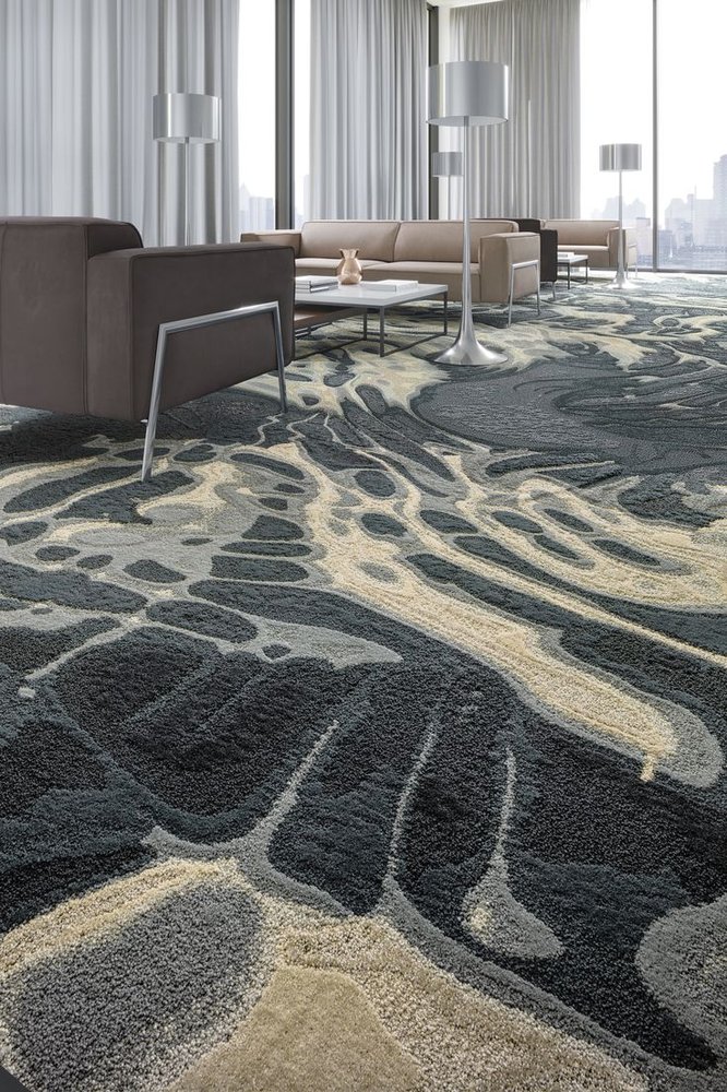 Charcoal grey and cream abstract organic pattern wall to wall carpet in modern penthouse